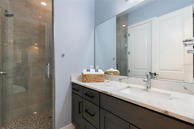 1702 Hidden Palms Dr, Davenport, FL 33897 - bathroom featuring vanity and a stall shower
