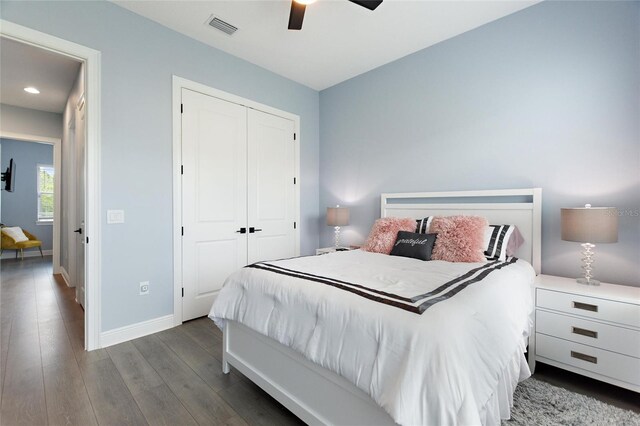 1702 Hidden Palms Dr, Davenport, FL 33897 - bedroom with a closet, dark wood finished floors, and a ceiling fan