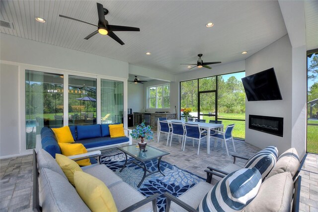 1702 Hidden Palms Dr, Davenport, FL 33897 - living room with ceiling fan and recessed lighting