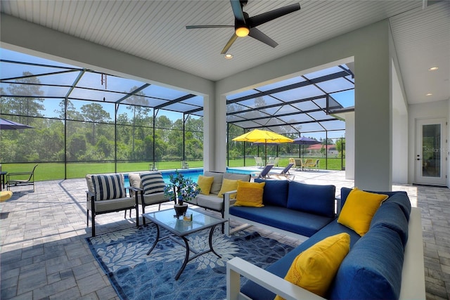 1702 Hidden Palms Dr, Davenport, FL 33897 - view of patio with an outdoor hangout area, glass enclosure, ceiling fan, and an outdoor pool
