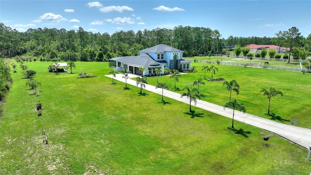1702 Hidden Palms Dr, Davenport, FL 33897 - view of subject property featuring a forest