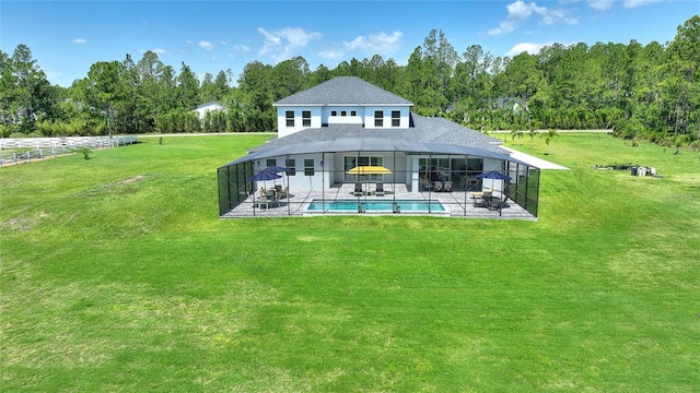 1702 Hidden Palms Dr, Davenport, FL 33897 - rear view of property with a patio area, an outdoor pool, a yard, and a lanai