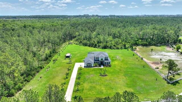 1702 Hidden Palms Dr, Davenport, FL 33897 - view of subject property with a forest