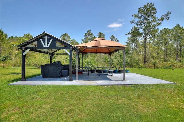 1702 Hidden Palms Dr, Davenport, FL 33897 - view of community with a gazebo, a lawn, and a patio