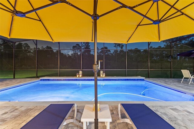 1702 Hidden Palms Dr, Davenport, FL 33897 - outdoor pool featuring a lanai and a patio