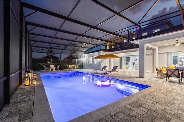 1702 Hidden Palms Dr, Davenport, FL 33897 - swimming pool with a patio, outdoor dining space, a lanai, and ceiling fan