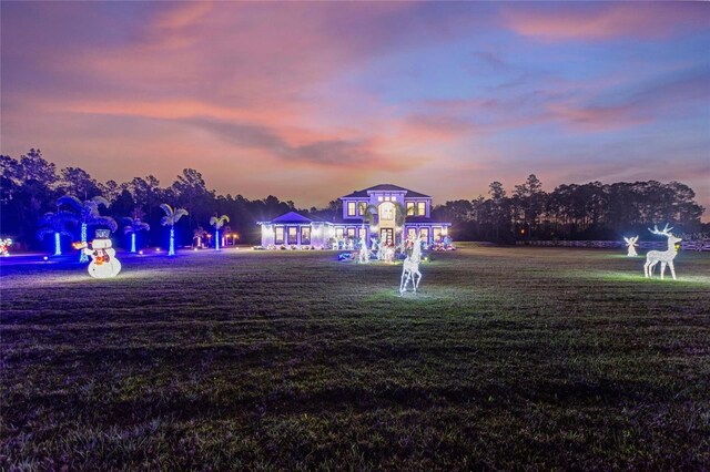 1702 Hidden Palms Dr, Davenport, FL 33897 - view of property's community with a lawn