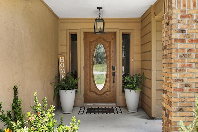 3184 Maltby Dr, Deltona, FL 32738 - doorway to property with stucco siding and brick siding