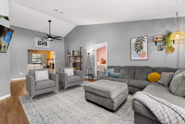 3184 Maltby Dr, Deltona, FL 32738 - living room featuring wood finished floors, lofted ceiling, and ceiling fan