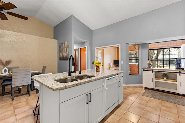 3184 Maltby Dr, Deltona, FL 32738 - kitchen featuring dishwasher, lofted ceiling, a ceiling fan, light stone counters, and light tile patterned flooring