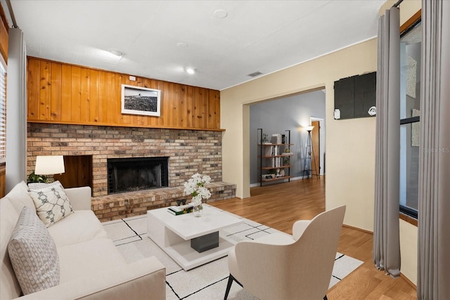 3184 Maltby Dr, Deltona, FL 32738 - living area with light wood finished floors and a fireplace