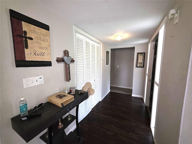 999 W Juniata St, Clermont, FL 34711 - corridor featuring wood finished floors and baseboards