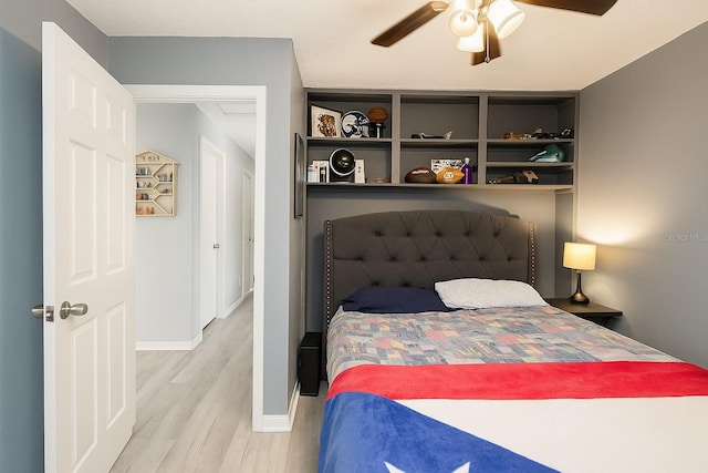 999 W Juniata St, Clermont, FL 34711 - bedroom with light wood-style flooring and a ceiling fan