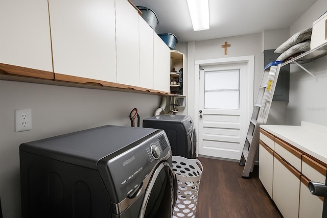 999 W Juniata St, Clermont, FL 34711 - laundry area featuring washer and clothes dryer, cabinet space, and dark wood-style floors