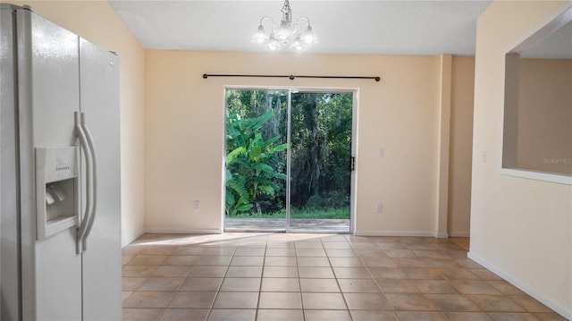 15925 Summit Ct, Clermont, FL 34711 - unfurnished dining area featuring a chandelier and tile patterned flooring