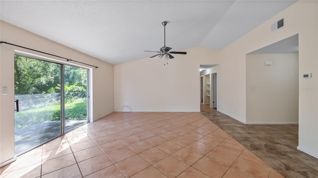 15925 Summit Ct, Clermont, FL 34711 - empty room with lofted ceiling, a ceiling fan, and light tile patterned floors