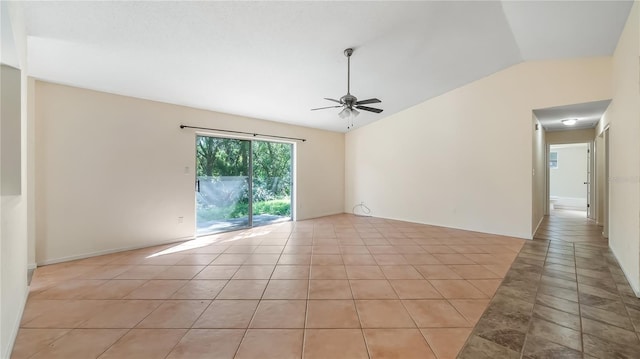 15925 Summit Ct, Clermont, FL 34711 - spare room featuring a ceiling fan, vaulted ceiling, and light tile patterned flooring