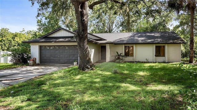 15925 Summit Ct, Clermont, FL 34711 - ranch-style house featuring an attached garage, concrete driveway, and a front yard