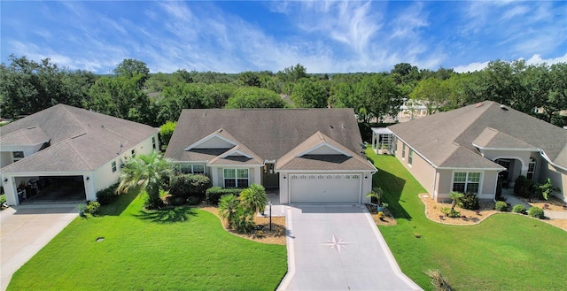 2369 Unity Ter, The Villages, FL 32162 - single story home with driveway, a front yard, and a garage