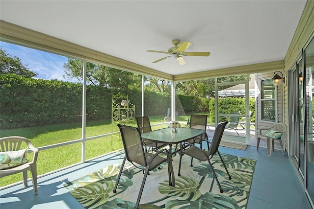 2369 Unity Ter, The Villages, FL 32162 - sunroom with ceiling fan, outdoor dining area, and plenty of natural light