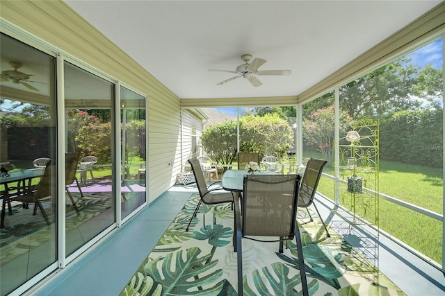 2369 Unity Ter, The Villages, FL 32162 - sunroom / solarium with a ceiling fan and outdoor dining space