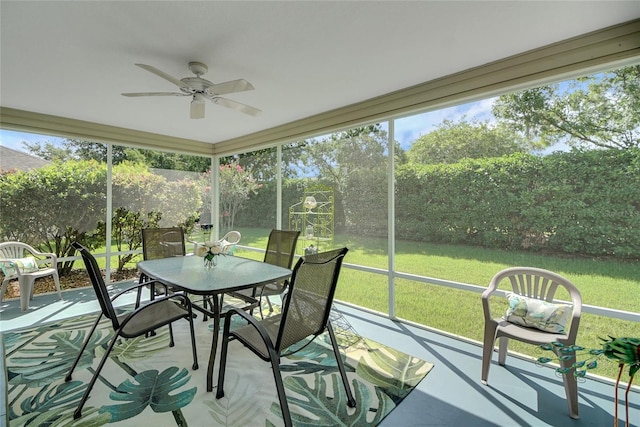 2369 Unity Ter, The Villages, FL 32162 - sunroom / solarium featuring ceiling fan and outdoor dining area