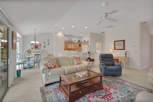 2369 Unity Ter, The Villages, FL 32162 - living room featuring light tile patterned floors, ceiling fan, vaulted ceiling, a chandelier, and recessed lighting