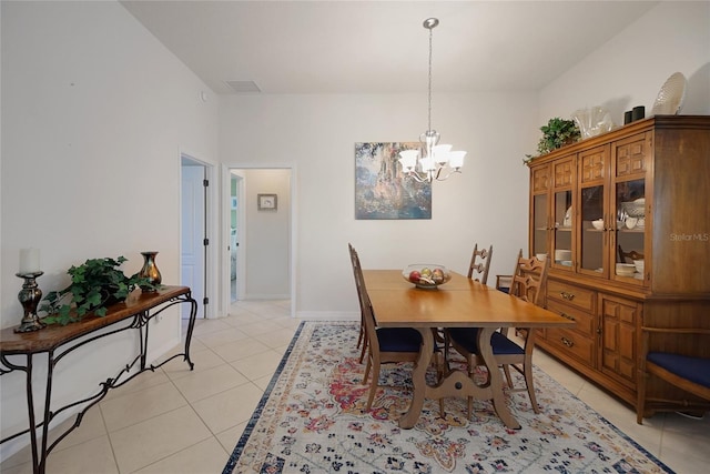 2369 Unity Ter, The Villages, FL 32162 - dining room with a chandelier and light tile patterned floors