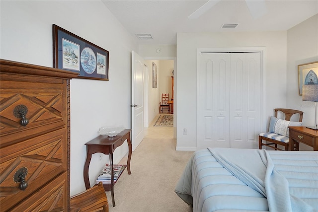 2369 Unity Ter, The Villages, FL 32162 - bedroom with a closet, light colored carpet, and ceiling fan