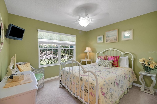 2369 Unity Ter, The Villages, FL 32162 - carpeted bedroom featuring baseboards and ceiling fan