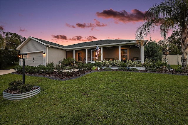 318 Stone Castle Loop, Lady Lake, FL 32159 - ranch-style home featuring an attached garage and covered porch