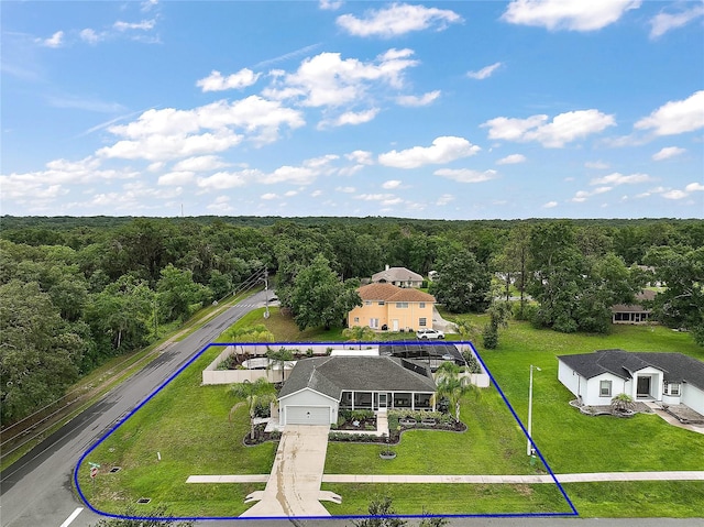 318 Stone Castle Loop, Lady Lake, FL 32159 - view of subject property with a forest and property parcel outlined