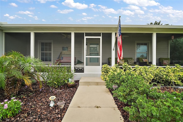 318 Stone Castle Loop, Lady Lake, FL 32159 - view of exterior entry featuring a porch