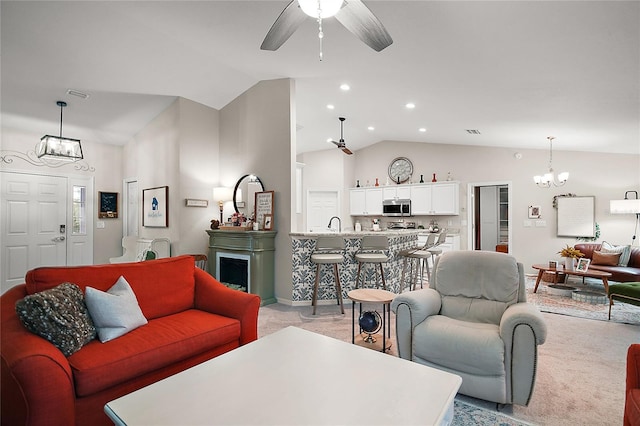 318 Stone Castle Loop, Lady Lake, FL 32159 - living room with lofted ceiling, a chandelier, light carpet, a ceiling fan, and recessed lighting