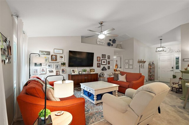 318 Stone Castle Loop, Lady Lake, FL 32159 - carpeted living area with lofted ceiling and ceiling fan