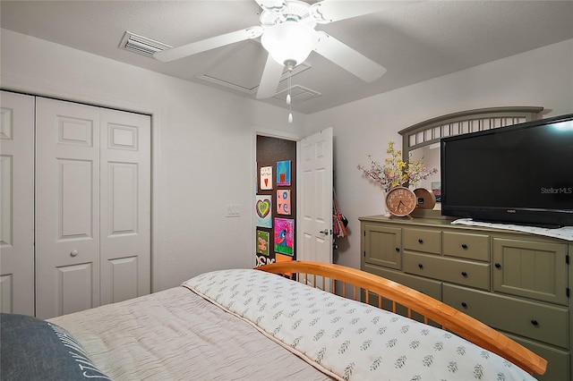 318 Stone Castle Loop, Lady Lake, FL 32159 - bedroom with attic access, a closet, and ceiling fan