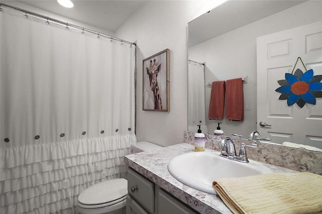 318 Stone Castle Loop, Lady Lake, FL 32159 - bathroom featuring vanity and toilet