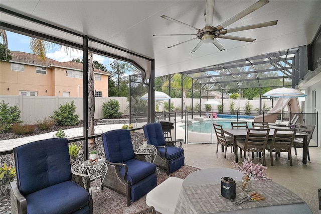 318 Stone Castle Loop, Lady Lake, FL 32159 - sunroom / solarium featuring ceiling fan, healthy amount of natural light, and outdoor dining area