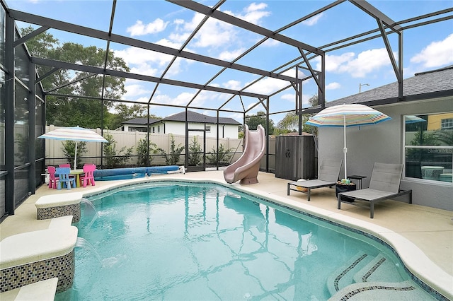 318 Stone Castle Loop, Lady Lake, FL 32159 - view of swimming pool featuring a water slide, a patio area, and a lanai