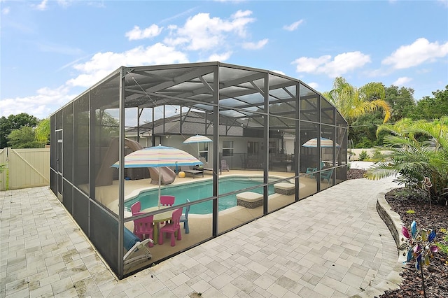 318 Stone Castle Loop, Lady Lake, FL 32159 - view of swimming pool with a patio, a gate, and glass enclosure