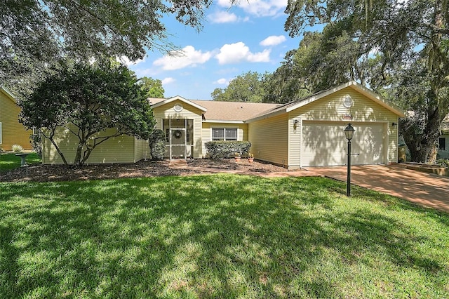 4300 Leafway Cir, Leesburg, FL 34748 - ranch-style house featuring a garage, a front lawn, and driveway