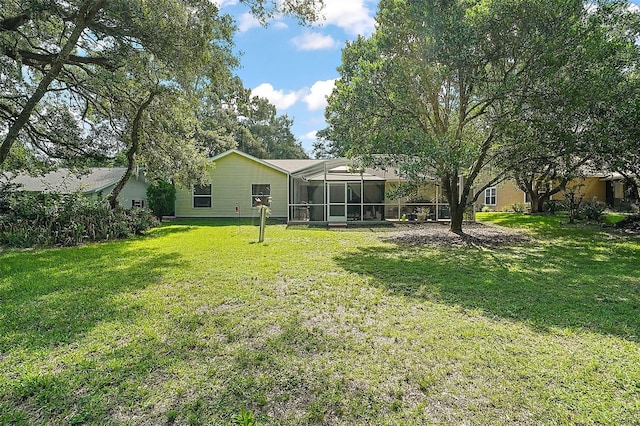 4300 Leafway Cir, Leesburg, FL 34748 - view of green lawn featuring a sunroom