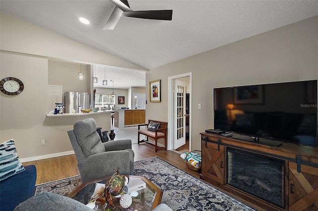 4300 Leafway Cir, Leesburg, FL 34748 - living area featuring ceiling fan, lofted ceiling, and wood finished floors