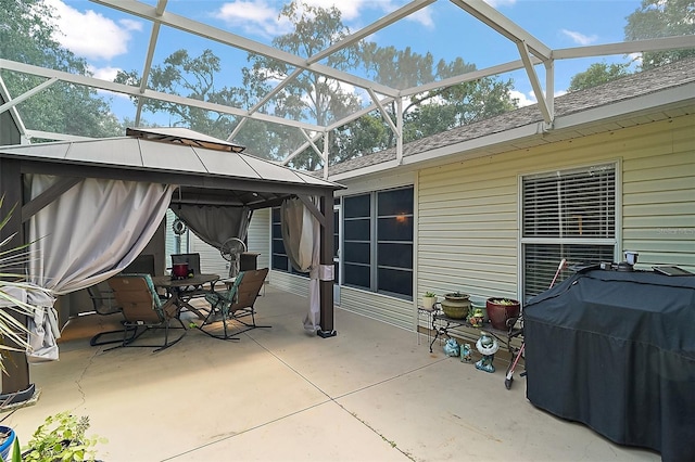 4300 Leafway Cir, Leesburg, FL 34748 - view of patio / terrace featuring a grill, a gazebo, outdoor dining area, and glass enclosure