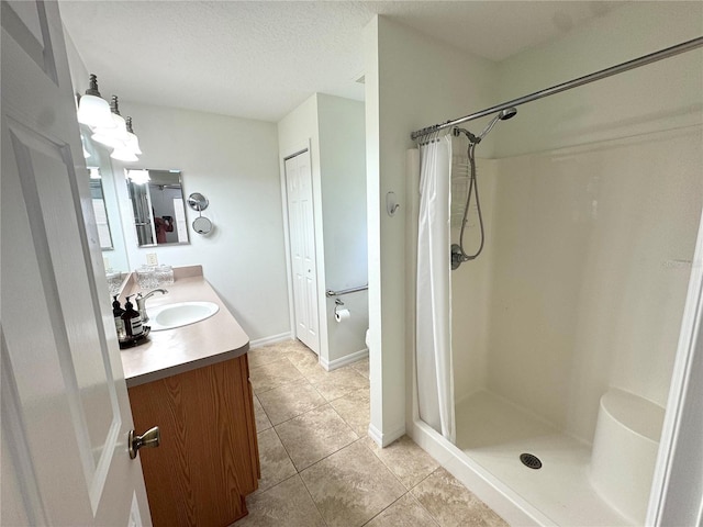 17483 SE 74th Netherclift Ter, The Villages, FL 32162 - full bath featuring vanity, tile patterned flooring, a shower with shower curtain, and a textured ceiling