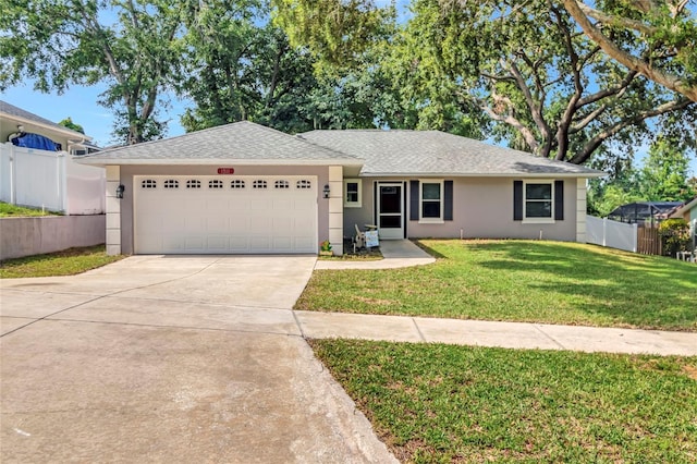 1511 W Magnolia St, Clermont, FL 34711 - single story home featuring a garage, driveway, stucco siding, and roof with shingles