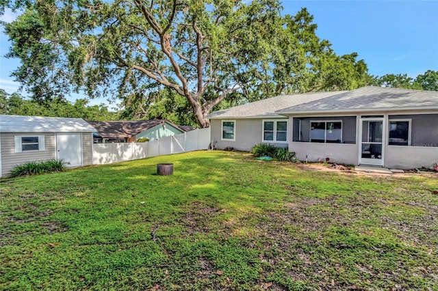 1511 W Magnolia St, Clermont, FL 34711 - view of yard featuring a sunroom and a storage unit