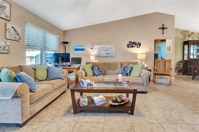 1511 W Magnolia St, Clermont, FL 34711 - living area featuring vaulted ceiling and light tile patterned flooring