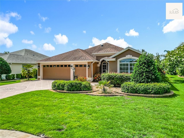 2994 Adrienne Way, The Villages, FL 32163 - view of front of home featuring stucco siding, a garage, concrete driveway, and a front yard
