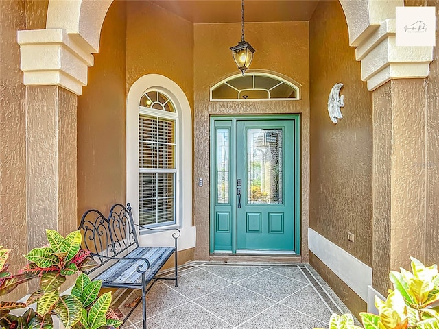 2994 Adrienne Way, The Villages, FL 32163 - entrance to property featuring stucco siding and covered porch